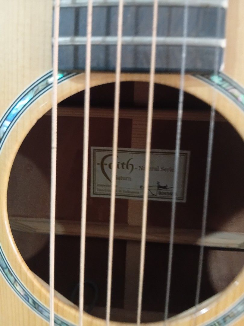 I'm selling guitar (Category: Announcements) located in Consolacion. Submitted by ymine69 (Listing ID 1469775189, Image 3). Description: Faith Saturn Acoustic professionally fitted Fishman electrics, including pre-amp, tuner, jack and XLR outputs. Gator hard case with keys included..