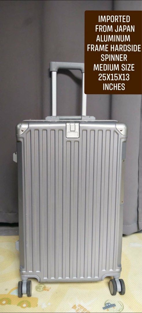 IMPORTED FROM JAPAN ALUMINUM FRAME HARDSIDE SPINNER MEDIUM SIZE (Category: Luggage) located in Manila. Submitted by chaychaii (Listing ID 1469805007, Image 1). Description: IMPORTED FROM JAPAN ALUMINUM FRAME HARDSIDE SPINNER MEDIUM SIZE 🔰 ALUMINUM FRAME HARDSIDE 🔰DUAL CLIPTYPE CLOSURE WITH SECURITY CODED LOCK 🔰 SMOOTH AND SILENT 360 ROTATION WHEELS 🔰 POLYCARBONATE HARDCASE 🔰TOP AND SIDE HANDLE CARRIER 🔰WIDER SPACE WITH DIVIDER 🔰WITH CUP HO