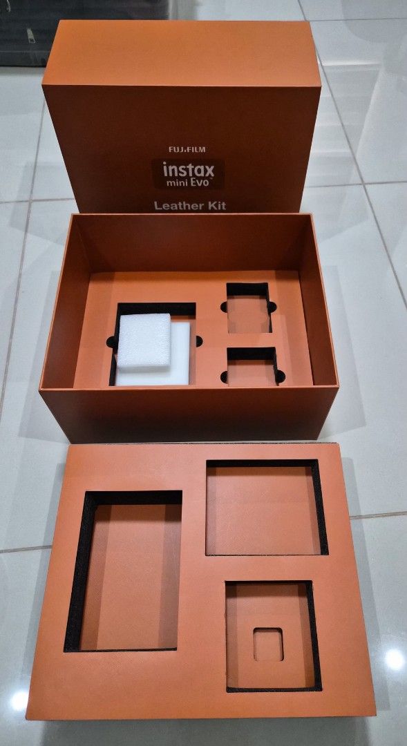 Instax Mini Evo Limited Edition Box (Category: Everything Else Others) located in Paranaque City. Submitted by lovelife.312 (Listing ID 1469837316, Image 3). Description: ***PLEASE READ CAREFULLY*** - 1 pc. Authentic Fujifilm Instax Mini Evo Leather Kit packaging box only (No camera or accessories included) - can be reused for crafting - decluttering room MAILING AND DELIVERY: - Meet up only SM City Sucat, Uptown Mall BGC and Ayala Malls by the B