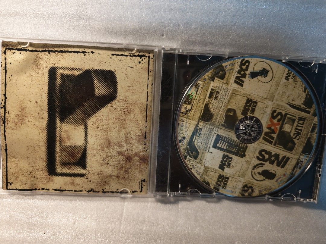 Inxs switch (Category: CDs & DVDs) located in Singapore. Submitted by oldoldtimes (Listing ID 1469788565, Image 3). Description: light scratch.