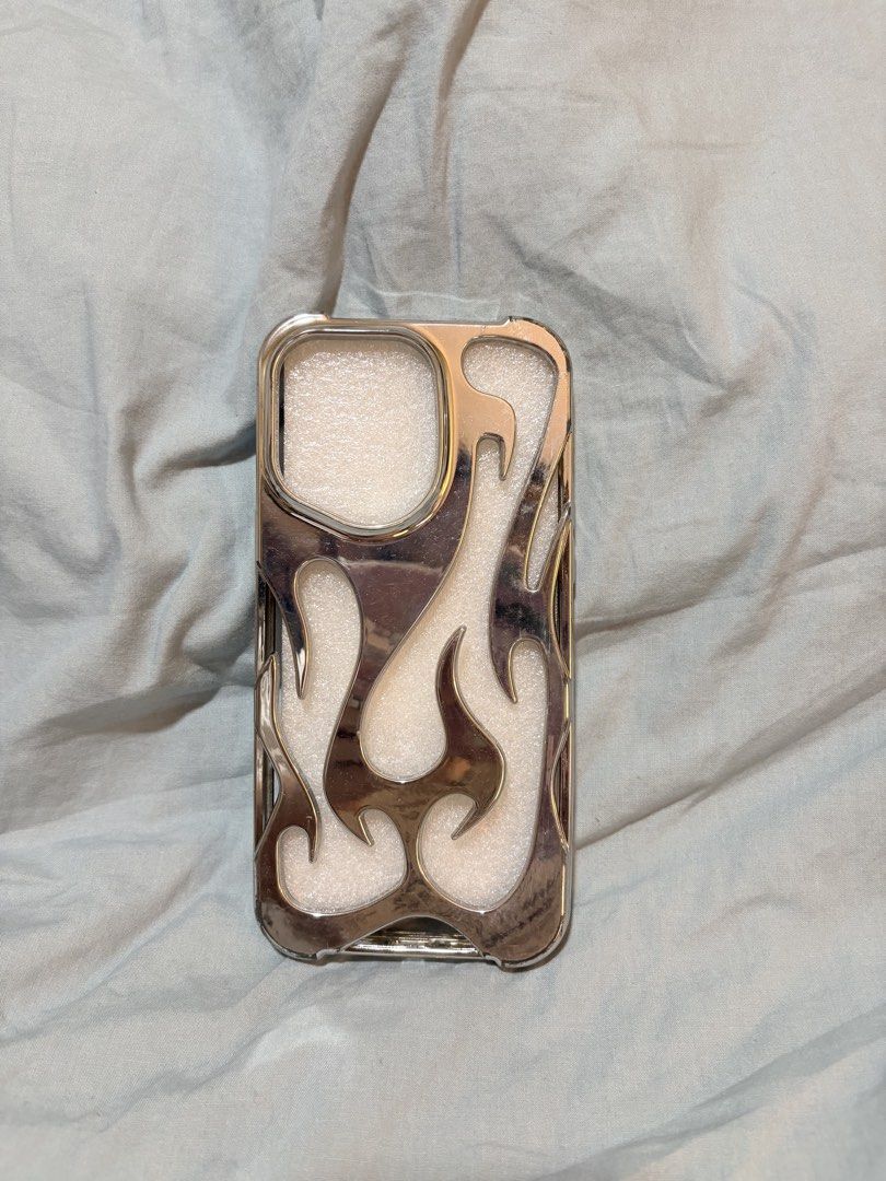 Ip 14 promax case (Category: Cases & Sleeves) located in Manila. Submitted by thriftwithgem (Listing ID 1469903246, Image 1). Description: - silver flame.