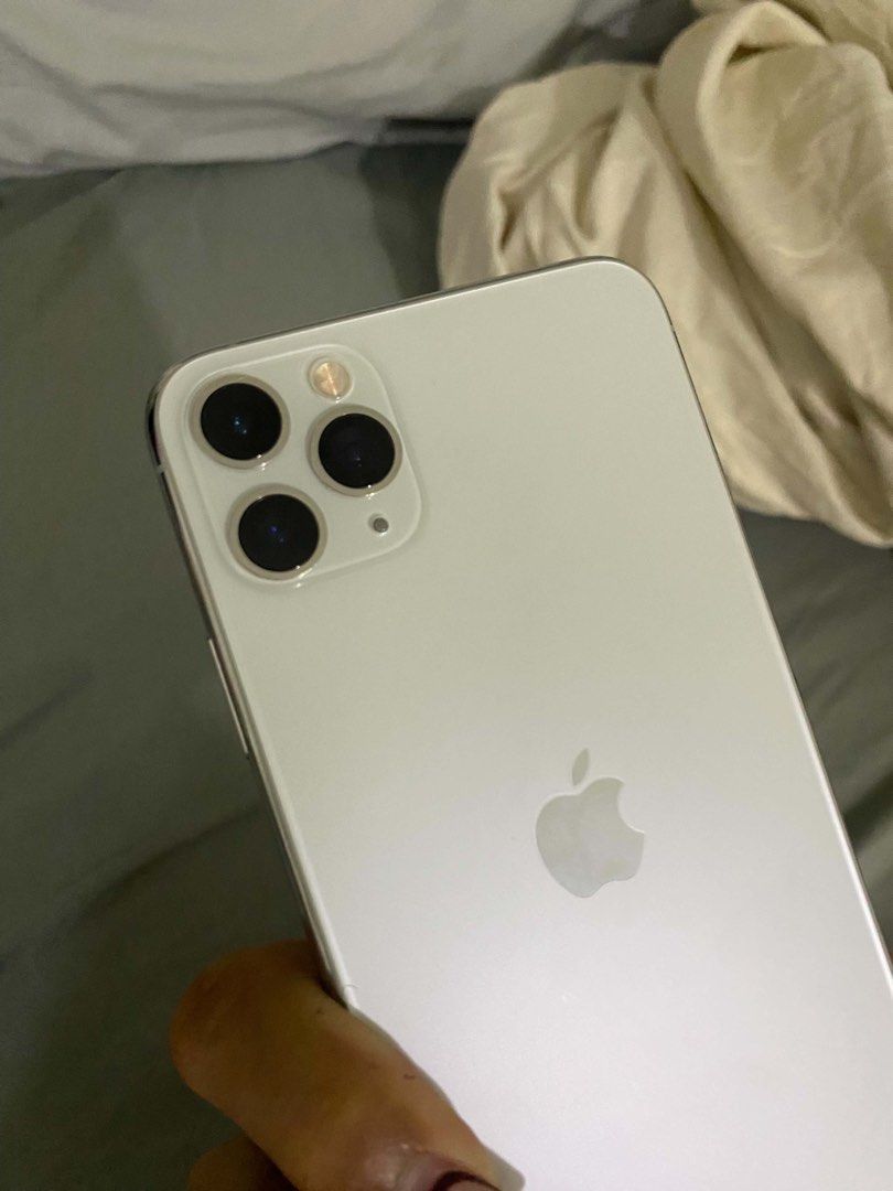 Iphone 11 Pro max (Category: iPhone 11 Series) located in Manila. Submitted by fast.cyrillemedina (Listing ID 1469890360, Image 3). Description: iPhone 11 Pro Max (white ) For sale and swap to lower unit +cash (swapping price is higher) 256GB 76% BH | Original Face ID working Truetone working No sim restrictions Never been repaired All parts still original ZP/A variant | NTC Approved Unit and 15pcs Case Manila, meetup near me.
