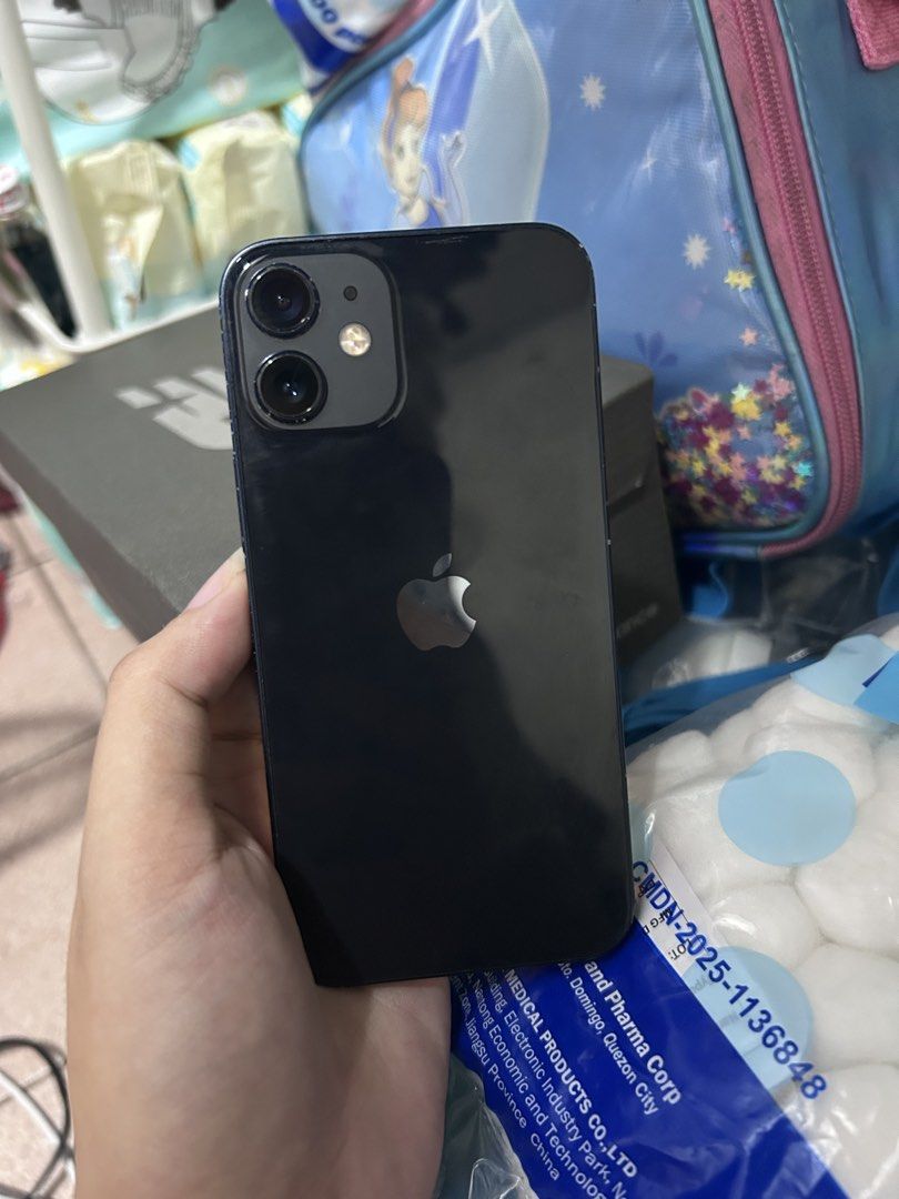 iPhone 12 Mini -64gb in Black (Category: iPhone 12 Series) located in Mandaluyong City. Submitted by aaye.44 (Listing ID 1469789143, Image 1). Description: - Model: iPhone 12 Mini - Storage: 64GB - Camera: Super linaw smooth sobra all working (face id & truetone✅) has dents / scratches (doesn’t affect the performance) reset / check all u want - Meetup Location: Mandaluyong City Hall.
