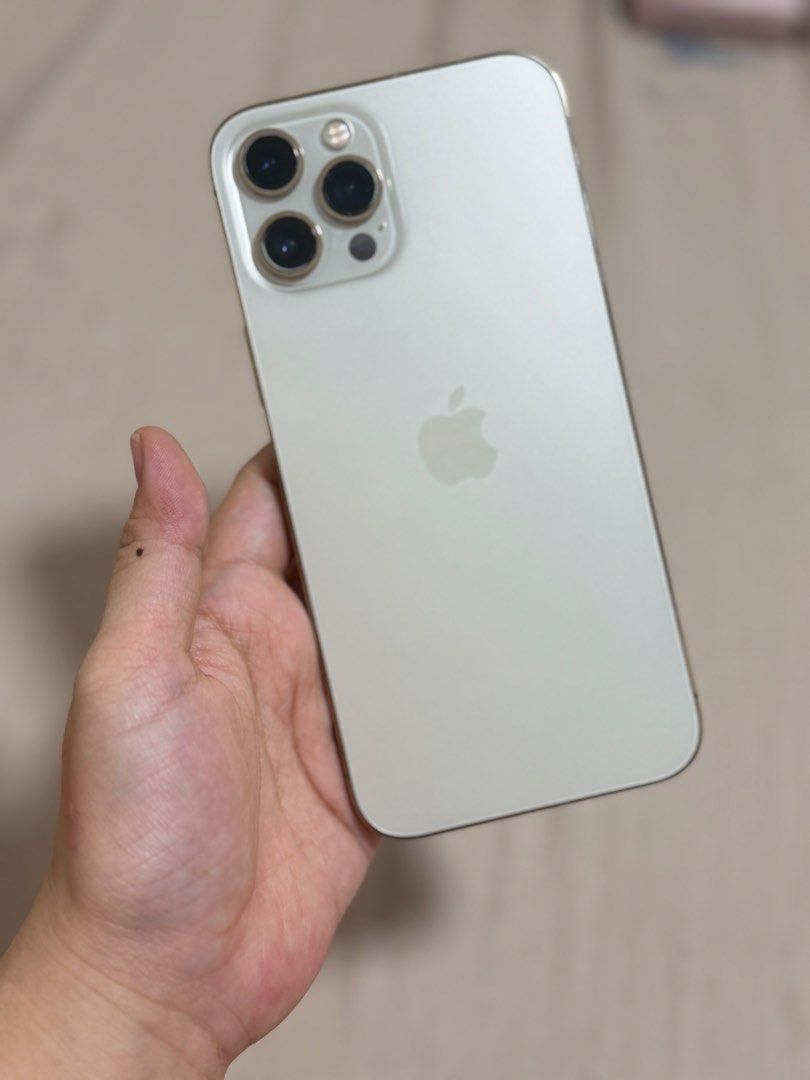 iPhone 12 Pro Max Gold 128GB (Category: iPhone 12 Series) located in Manila. Submitted by iykyklou (Listing ID 1469798185, Image 3). Description: Minimal scratches Only issue is yung lock/unlock button medyo need diinan 128gb, battery replacement required (nasa 75% battery health na lang) Unit only, no other inclusions Rfs: upgraded to iPhone 17 pro max already Location: Calamba Laguna Price negotiable Can meet up in Calamba or Makati (by sched).
