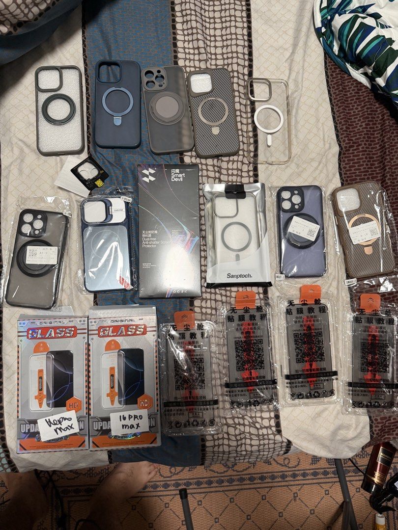 iPhone 16 pro max cases and tempered glass (Category: Cases & Sleeves) located in Makati City. Submitted by justinchuu (Listing ID 1469774597, Image 2). Description: Selling cases and tempered glass for iphone 16 promax. Take all. 7 tempered glass - 1 smart devil - 2 hd tempered glass with installer - 4 privacy tempered glass 10 phone case - 5 new case - 3 slightly used - 2 used.