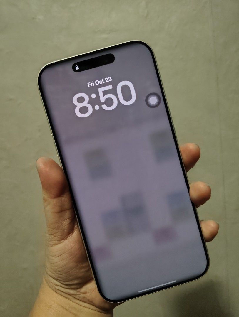 iphone 17 Pro max 256 GB Silver (Category: iPhone 17 Series) located in Pasig City. Submitted by jhaminocencio08 (Listing ID 1469884664, Image 2). Description: - Model: White iPhone with glass back panel and iconic Apple logo - Display: Active front screen featuring the Dynamic Island cutout - Camera: Professional triple camera setup on the back - Ports: Modern USB-C port and bottom speaker grills - Inclusions: Comes with original retail box - Co