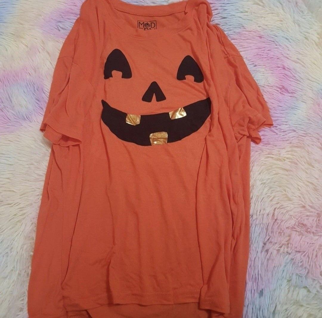 Jack o lantern halloween top (Category: Blouses) located in Las Pinas. Submitted by assortedkidzstuffs (Listing ID 1469815306, Image 3). Description: bnew with tag imported from USA really pretty XL on tag (fits medium to XL).