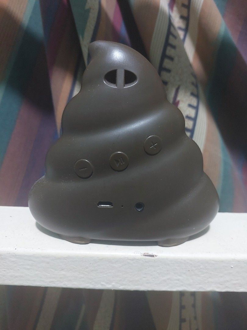 Jamoji Poop Bluetooth Speaker HX-PEM04 (Category: Soundbars, Speakers & Amplifiers) located in Quezon City. Submitted by pandajack0910.1 (Listing ID 1469864794, Image 2). Description: - Brand/Model: Jamoji HX-PEM04 Bluetooth Speaker - Design: Fun poop emoji with googly eyes and brown plastic body - Features: Rear control buttons, micro USB charging port, and rubber feet for stability - Condition: Works great, tested and fully functional - Perfect