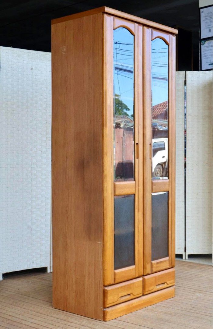 JAPAN SURPLUS 2 DOOR GLASS CABINET (Category: Dry Boxes & Cabinets) located in Manila. Submitted by justinlei.103 (Listing ID 1469929432, Image 1). Description: JAPAN SURPLUS FURNITURE SLIM CABINET WITH 2 GLASS DOORS ADJUSTABLE SHELVES Size 23.5L x 17W x 70H in inches (AS-IS ITEM) *Minimal Scratch Only IN GOOD CONDITION.