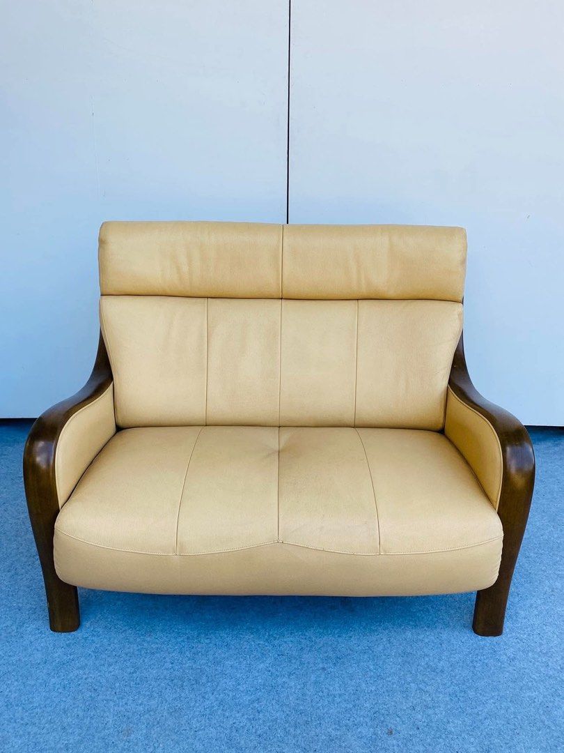 JAPAN SURPLUS WOODEN SOFA (Category: Chairs) located in Manila. Submitted by justinlei.103 (Listing ID 1469928908, Image 1). Description: “JAPAN SURPLUS” “DIRETTORE” LEATHER SOFA WITH WOODEN CURVED ACCENT SIZE: 42L” x 25W” x 15Sh” x 34H” inches (AS-IS ITEM) IN GOOD CONDITION.