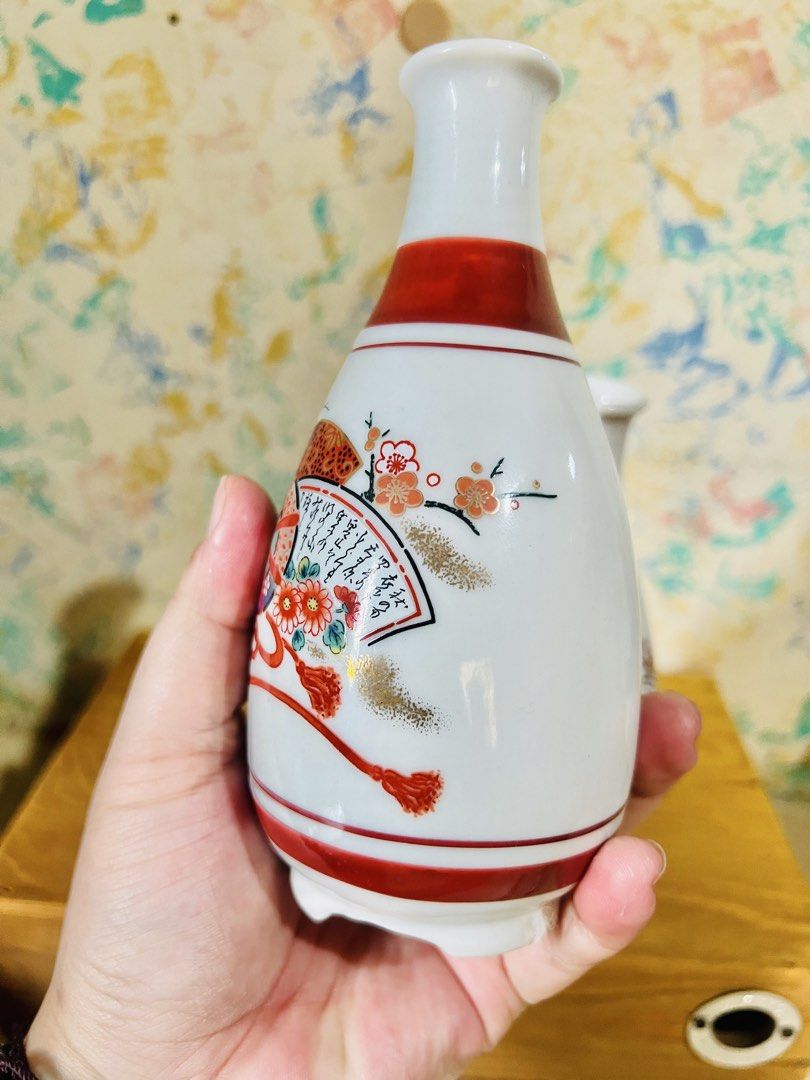 Japanese Ceramic Sake Jars/Decanter Set (per set/take all) (Category: Other Kitchenware & Tableware) located in Taguig. Submitted by lae.onlineshop (Listing ID 1469763827, Image 3). Description: Japanese Ceramic Sake Jars/Decanter Set *SOLD AS SET ONLY. Set of 2. *Hand-painted over Glazed Surface. Can be used for hot and cold beverages/drinks. *THE COLOR MAY SLIGHTLY DIFFER FROM ACTUAL DUE TO LIGHTING AND/OR SCREEN RESOLUTION. Size: approx 15cm x