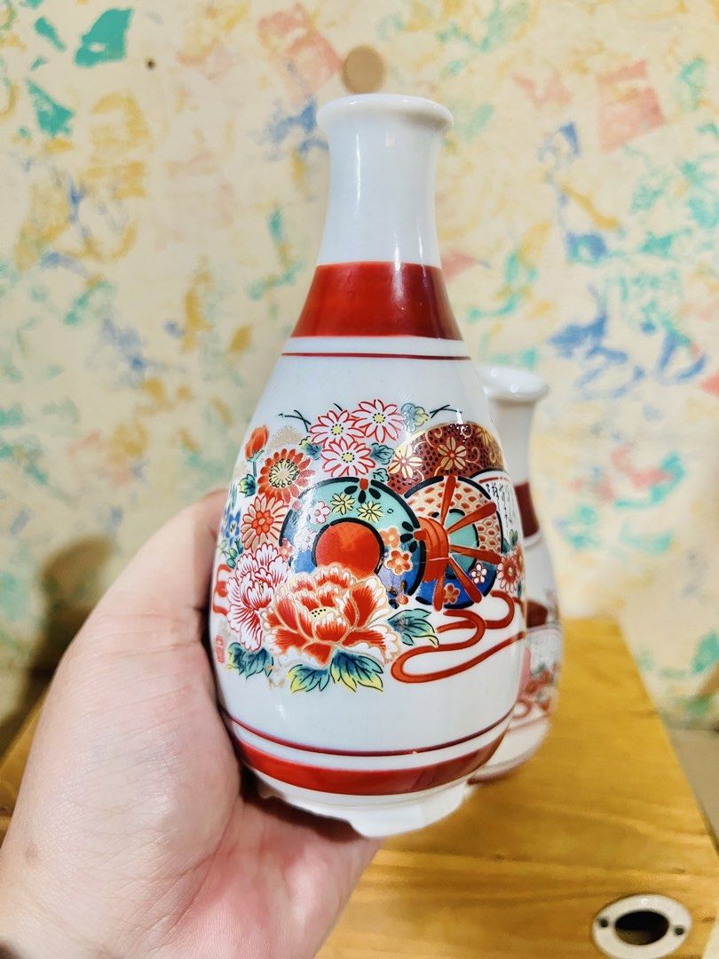 Japanese Ceramic Sake Jars/Decanter Set (per set/take all) (Category: Other Kitchenware & Tableware) located in Taguig. Submitted by lae.onlineshop (Listing ID 1469763827, Image 2). Description: Japanese Ceramic Sake Jars/Decanter Set *SOLD AS SET ONLY. Set of 2. *Hand-painted over Glazed Surface. Can be used for hot and cold beverages/drinks. *THE COLOR MAY SLIGHTLY DIFFER FROM ACTUAL DUE TO LIGHTING AND/OR SCREEN RESOLUTION. Size: approx 15cm x