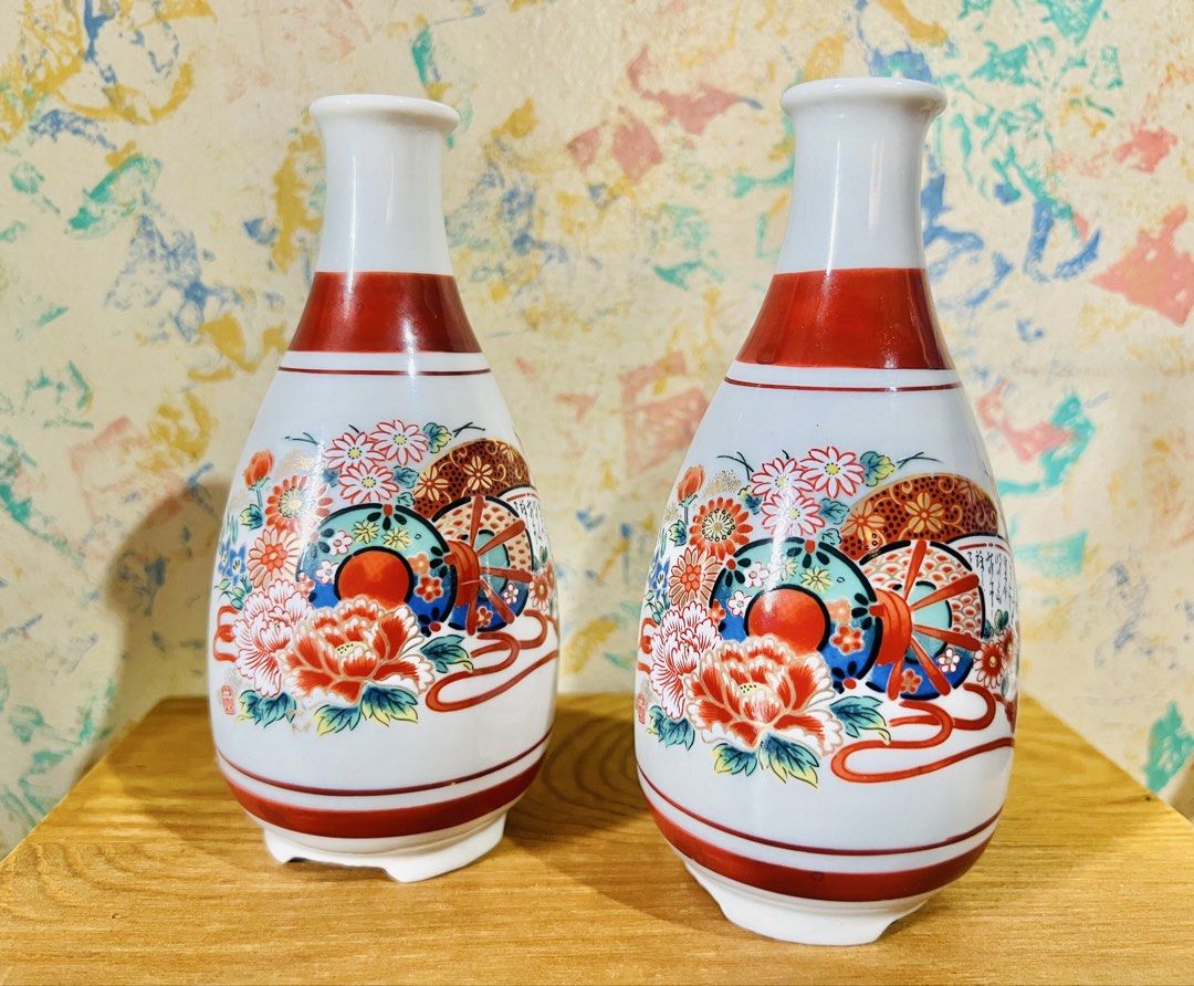 Japanese Ceramic Sake Jars/Decanter Set (per set/take all) (Category: Other Kitchenware & Tableware) located in Taguig. Submitted by lae.onlineshop (Listing ID 1469763827, Image 1). Description: Japanese Ceramic Sake Jars/Decanter Set *SOLD AS SET ONLY. Set of 2. *Hand-painted over Glazed Surface. Can be used for hot and cold beverages/drinks. *THE COLOR MAY SLIGHTLY DIFFER FROM ACTUAL DUE TO LIGHTING AND/OR SCREEN RESOLUTION. Size: approx 15cm x