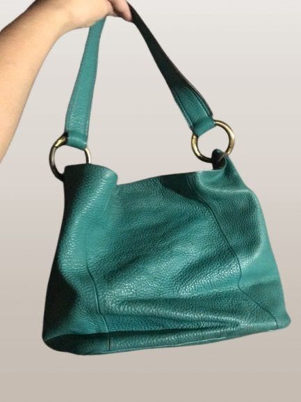 JILL SCOTT TEAL BLUE TOTE LEATHER BAG (Category: Tote Bags) located in Marikina City. Submitted by minimalistmanila (Listing ID 1469906019, Image 2). Description: Genuine Jill Scott pebbled leather teal blue bag. Medium roomy size. Bought abroad. In good condition with bottom rubbings. Can be painted on at leather shop. Inside has stains on inner cloth but can be cleaned as not used in a while. Order now! .