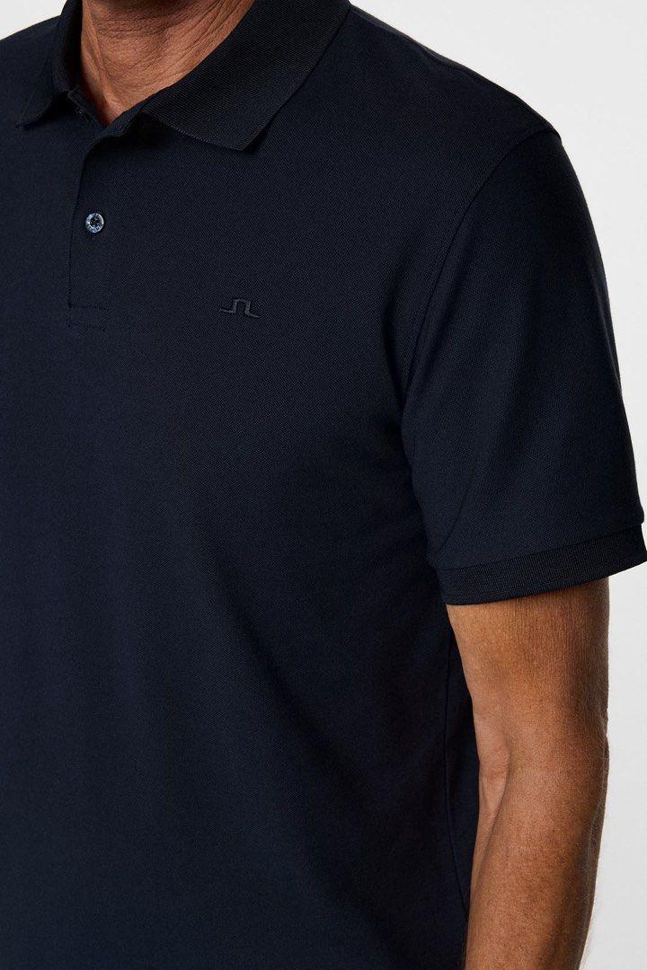 j.lindeberg Troy Pique Polo Dark Navy (Category: Tshirts & Polo Shirts ) located in Manila. Submitted by whowearsstreetwear (Listing ID 1469920825, Image 1). Description: J.Lindeberg Troy Pique Polo Dark Navy (Authentic) - Size: Large on tag (measurements in inches) W - 21 L - 27 Condition: As New Flaw/s: none + shipping fee Location: Manila (Near UST).