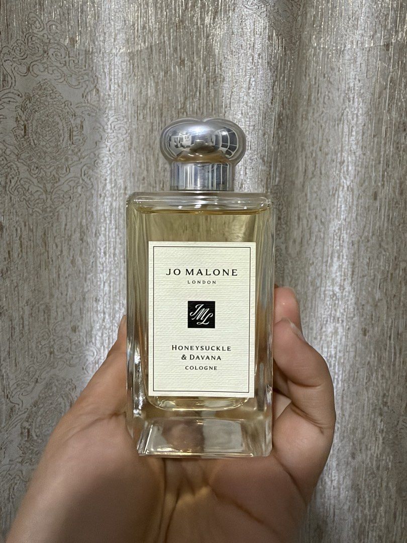 Jo Malone Honeysuckle & Davana Cologne (Category: Fragrance & Deodorants) located in Quezon City. Submitted by mypersonalprelab (Listing ID 1469774151, Image 1). Description: - Brand: Jo Malone London - Fragrance: Honeysuckle & Davana (Woody & Floral scent profile) - Bottle: Generous size, clear glass square design with a silver cap - Condition: Authentic with original front label branding - Perfect addition to any fragrance collection - Limited 