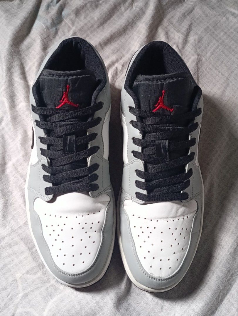 Jordan 1 Low Light Smoke Grey Size US 9.5 (Category: Sneakers) located in Manila. Submitted by keenforest.c4b4c0 (Listing ID 1469865086, Image 2). Description: - Model: Nike Air Jordan 1 Low (Style Code: 553558-030) - Colorway: Light Smoke Grey / White / Black - Size: US 9.5 / UK 8.5 / EUR 43 - Features: Iconic black swoosh, red embroidered Wings logo on the heel, and Jumpman logo on the tongue - Condition: Clean outsoles with minimal wear on the