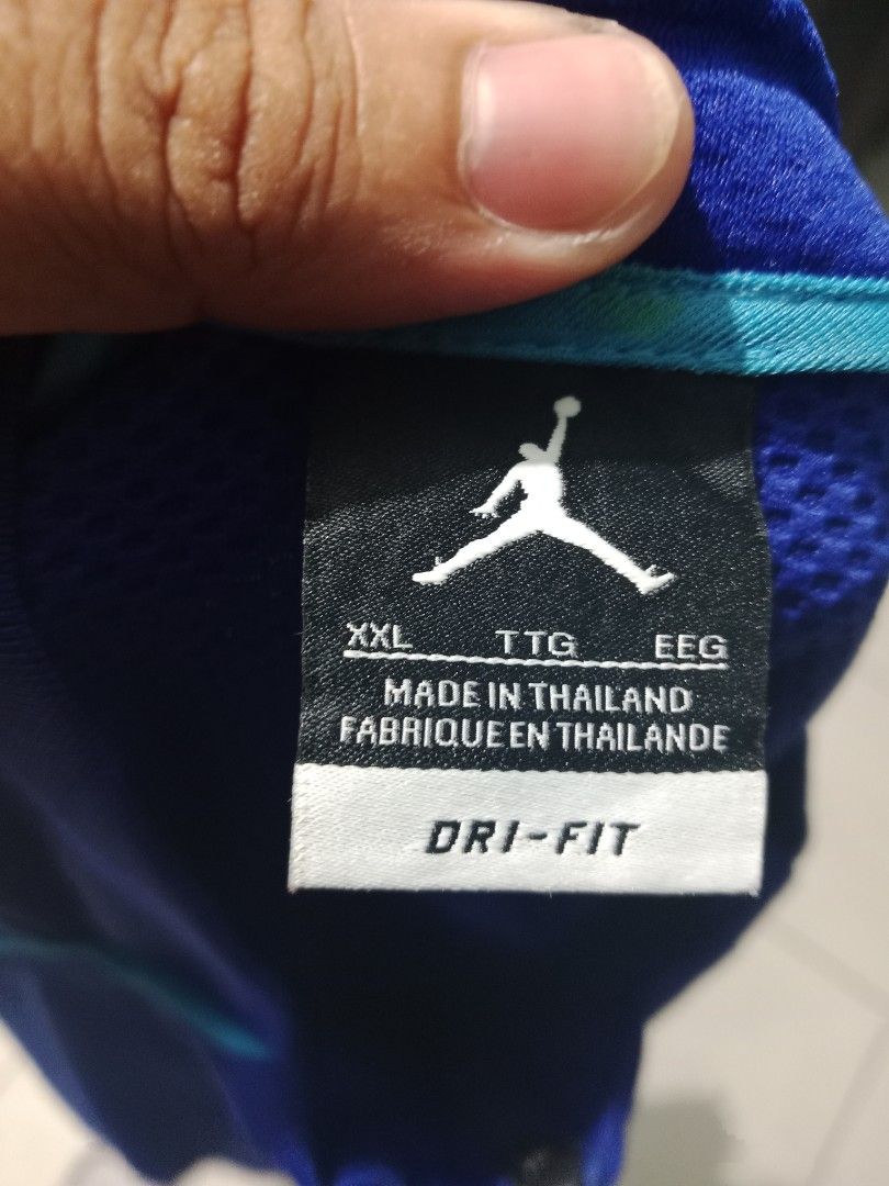 Jordan Dri-Fit Track Jacket Blue XXL (Category: Coats, Jackets and Outerwear) located in Bacolod City. Submitted by jorengrate26639 (Listing ID 1469892022, Image 3). Description: - Brand: Jordan - Style: Track Jacket (Style Code: 404341-409) - Color: Royal Blue with Turquoise Piping - Size: XXL (Regular Fit) - Material: Dri-Fit fabric technology for moisture-wicking comfort - Design: Full zip front, mock neck, ribbed cuffs and hem - Branding: Ico