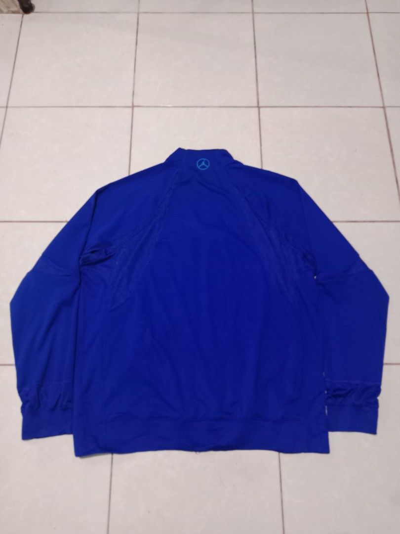 Jordan Dri-Fit Track Jacket Blue XXL (Category: Coats, Jackets and Outerwear) located in Bacolod City. Submitted by jorengrate26639 (Listing ID 1469892022, Image 2). Description: - Brand: Jordan - Style: Track Jacket (Style Code: 404341-409) - Color: Royal Blue with Turquoise Piping - Size: XXL (Regular Fit) - Material: Dri-Fit fabric technology for moisture-wicking comfort - Design: Full zip front, mock neck, ribbed cuffs and hem - Branding: Ico