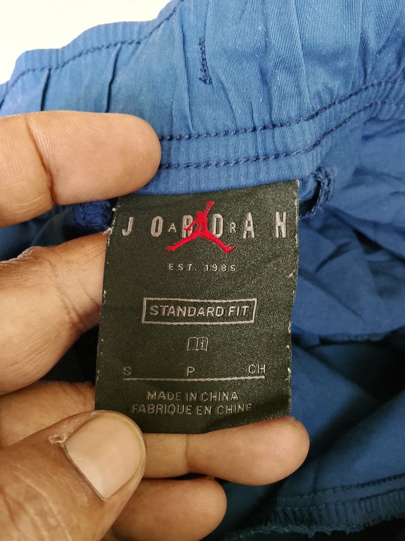 Jordan Flight Cargo Pants Blue Size S (Category: Joggers) located in Manila. Submitted by arjaygoodfind (Listing ID 1469832015, Image 3). Description: - Brand/Model: Jordan Flight Cargo Pants (Style: CV3178-492) - Color: Blue - Size: Small (Waist: 75cm) - Material: 58% cotton, 42% nylon - Fit: Standard fit with elastic drawstring waistband - Details: Bungee cord adjusters at cuffs, large utility thigh pockets, and Jordan Flight logo patch.