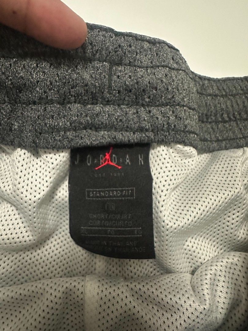 Jordan Jumpman Diamond (Category: Shorts) located in Manila. Submitted by rodeltzy (Listing ID 1469824043, Image 2). Description: - Authentic Jordan mesh shorts - Color: Olive Green / Dark Grey - Size: XL (Standard fit) - Material: 100% breathable polyester mesh - Features: Elastic waistband with adjustable black drawstring, large white Jumpman logo on lower sides, and secure zippered back pocket - Style Code: CU2350-325 - Origin: Made in Thailan