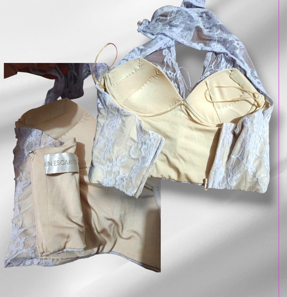 Jun Escario White Lace Halter Crop Top (Category: Sleeveless) located in Paranaque City. Submitted by calm_youngstore7 (Listing ID 1469770502, Image 2). Description: - Designer piece: Authentic Jun Escario label - Style: White lace halter crop top with adjustable neck ties - Support: Structured underwire cups with a contrasting beige lining - Closure: Secure back zipper - Condition: NWOT Excellent.