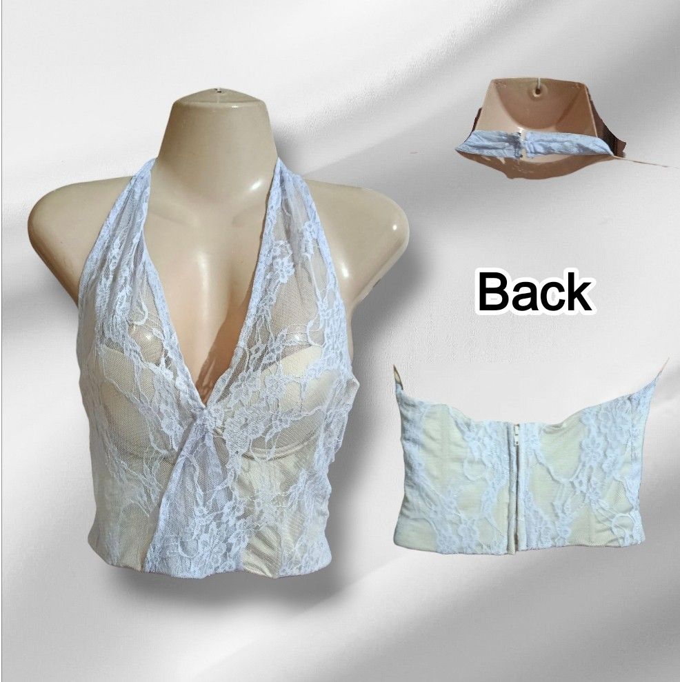 Jun Escario White Lace Halter Crop Top (Category: Sleeveless) located in Paranaque City. Submitted by calm_youngstore7 (Listing ID 1469770502, Image 1). Description: - Designer piece: Authentic Jun Escario label - Style: White lace halter crop top with adjustable neck ties - Support: Structured underwire cups with a contrasting beige lining - Closure: Secure back zipper - Condition: NWOT Excellent.