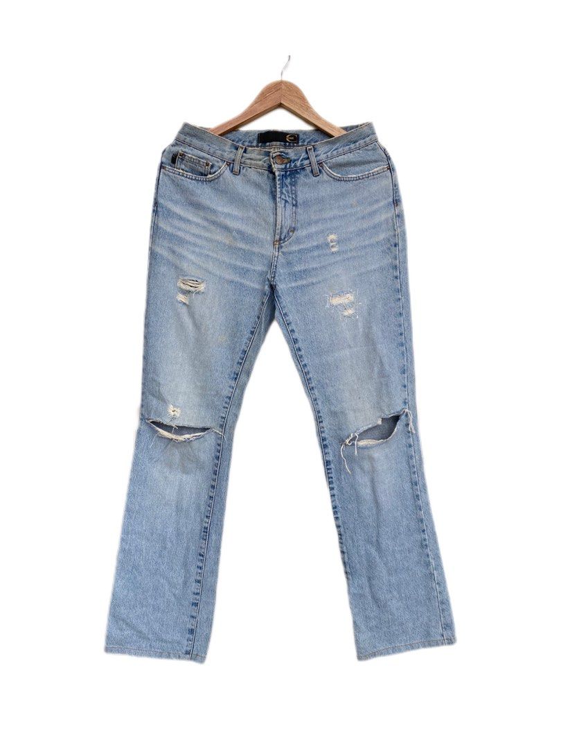 Just Cavalli 2000s Distressed Denim Jeans (Category: Jeans) located in Iloilo. Submitted by fukurou.vision (Listing ID 1469832985, Image 1). Description: Just Cavalli 2000s Distressed Denim Jeans Dimensions are in inches Waist - 28 Length - 41 Leg opening - 8.5 These denim jeans hail from Roberto Cavalli’s diffusion line Just Cavalli, launched in the late 1990s and defining early 2000s Italian denim flair. Produced under license by renowned Itali