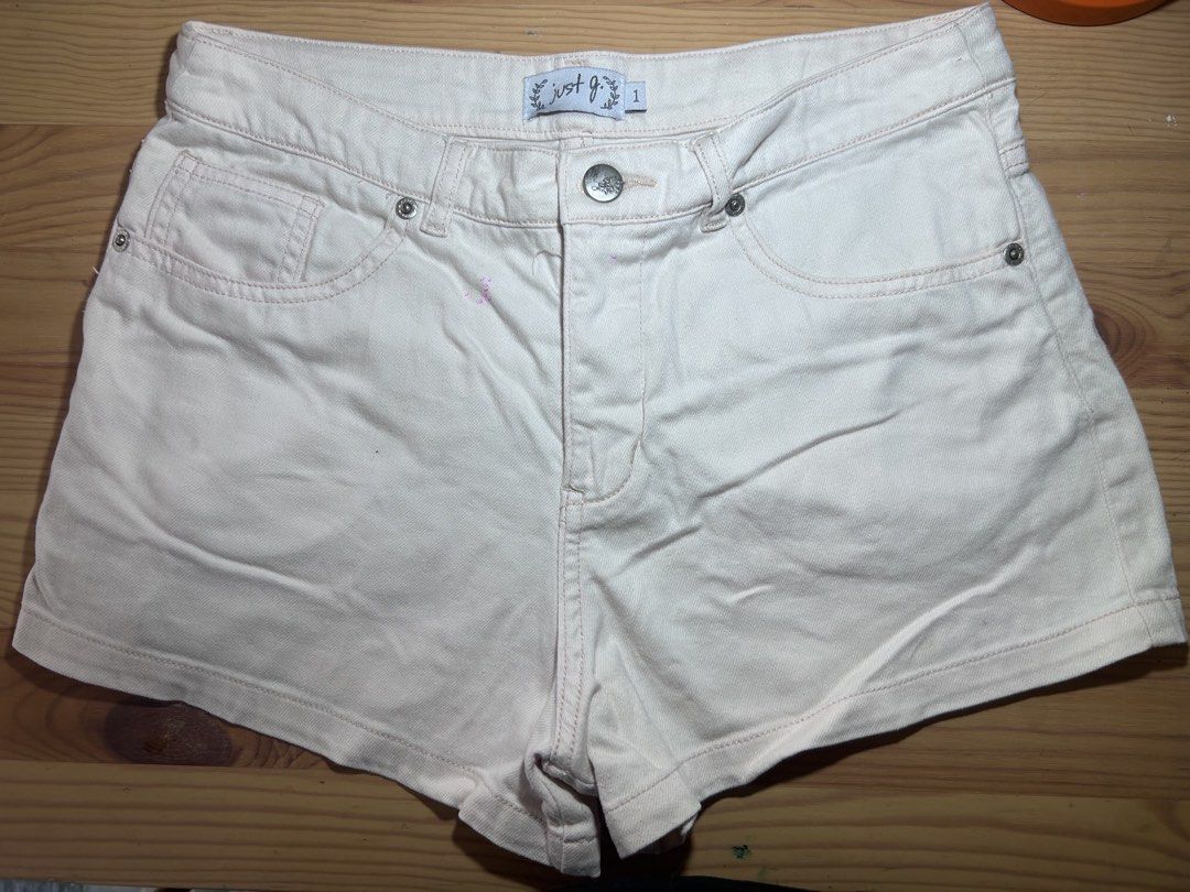 just.g. White Denim Shorts Size 1 (Category: Shorts) located in Quezon City. Submitted by smithram (Listing ID 1469786202, Image 1). Description: - Brand: Just.G - Size: 1 - Color: White denim with light stitching - Style: Classic five-pocket design, metal button closure, and zip fly - Back: Clean with two functional patch pockets.