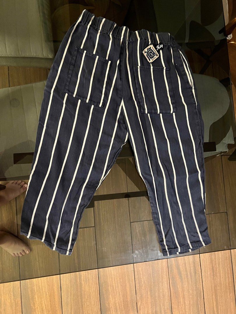 Kapital Easy Beach Go Pants Size 2 (Category: Trousers) located in Mandaluyong City. Submitted by johngil101 (Listing ID 1469893663, Image 2). Description: - Brand: Kapital - Design: Navy and white stripes with a relaxed cropped fit - Material: 100% premium cotton, Made in Japan - Waistband: Elastic band featuring a stylish zigzag print inside - Pockets: Two back patch pockets complete with the signature Kapital tag - Care: Hand wash only - Condi