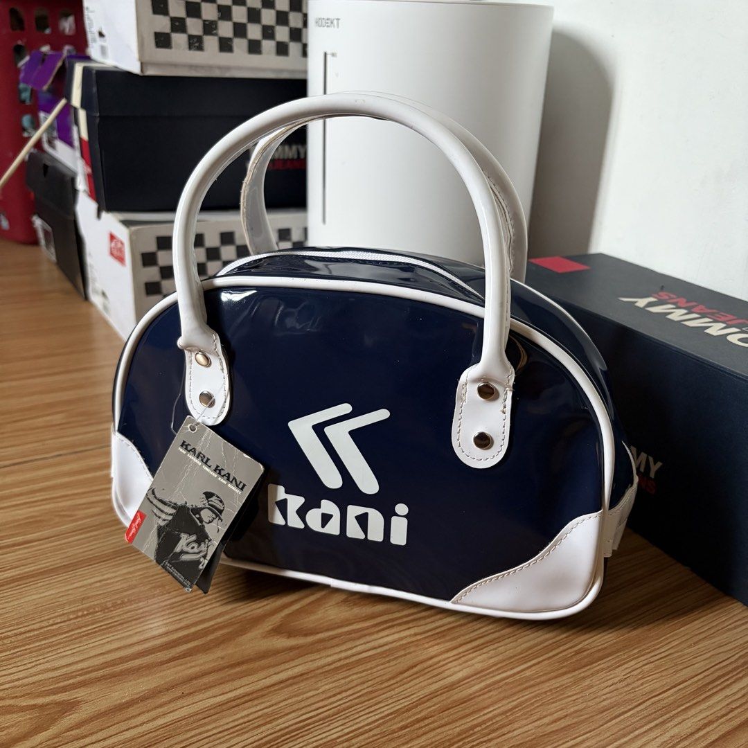 Karl Kani Mini Boston Bag (Category: Clutches) located in Talisay. Submitted by re_sell01 (Listing ID 1469784338, Image 1). Description: Karl Kani Mini Boston Bag Color: Blue/ White Like New Condition.