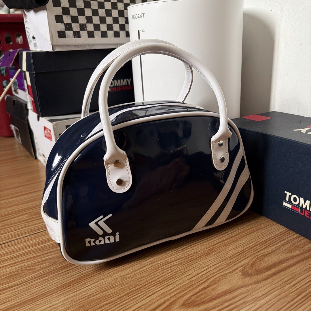 Karl Kani Mini Boston Bag (Category: Clutches) located in Talisay. Submitted by re_sell01 (Listing ID 1469784338, Image 2). Description: Karl Kani Mini Boston Bag Color: Blue/ White Like New Condition.