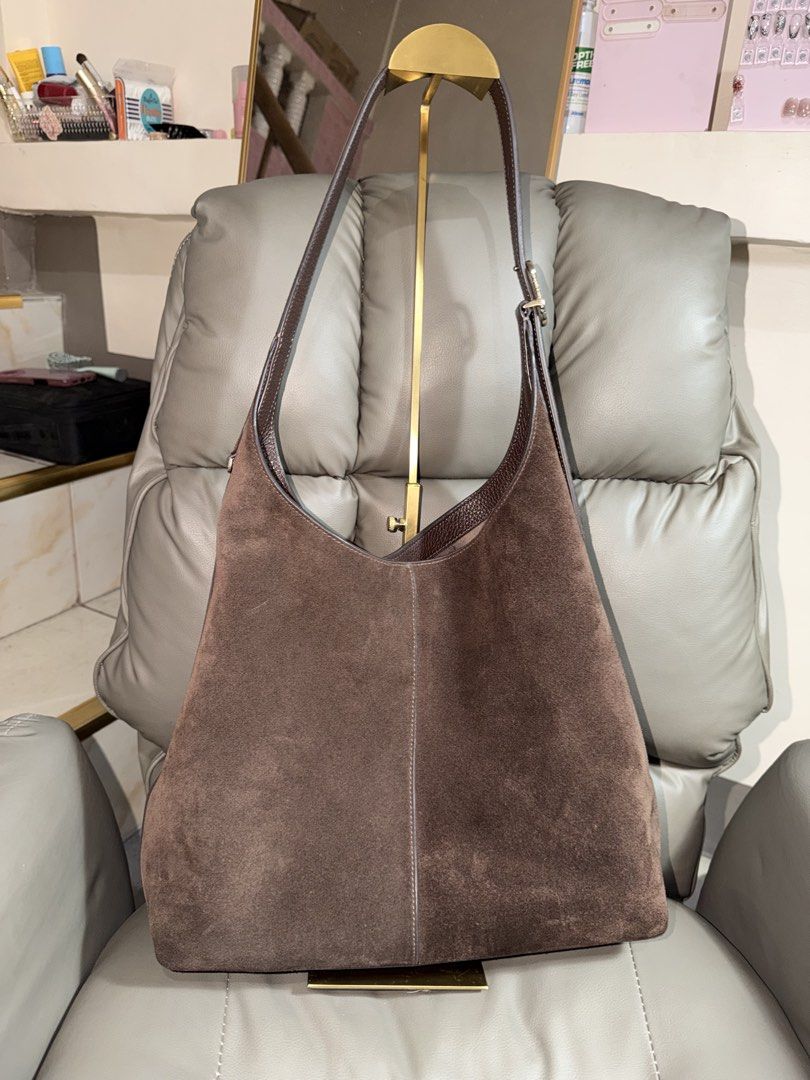 Kate Spade Hot Fudge Suede (Category: Tote Bags) located in Manila. Submitted by pinkkitkat (Listing ID 1469929367, Image 3). Description: Kate Spade 454 Large Bag in Hot Fudge 🤎 * Well taken care of 😊 * 9.5/10 condition * Authentic, gifted to me from the US 🇺🇸 * Meetups around Makati, by schedule * Located in Tondo, Manila 📍 * Lalamove/Grab ready 🚗 PM for inquiries! 💌.