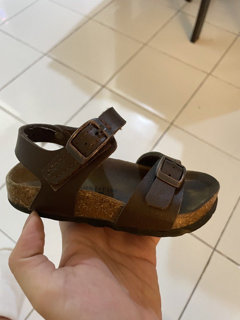 Kids Sandals (Category: Babies & Kids Fashion) located in Mandaluyong City. Submitted by efril.pecson (Listing ID 1469908746, Image 3). Description: - Brand: Florsheim - Size: 25 - Color: Dark Brown - Material: Genuine Leather - Design: Double strap with adjustable metal buckles and secure back strap - Comfort: Contoured footbed for all-day wear - Condition: Great everyday footwear with normal signs of wear on the footbed Bought at SM Dept last y