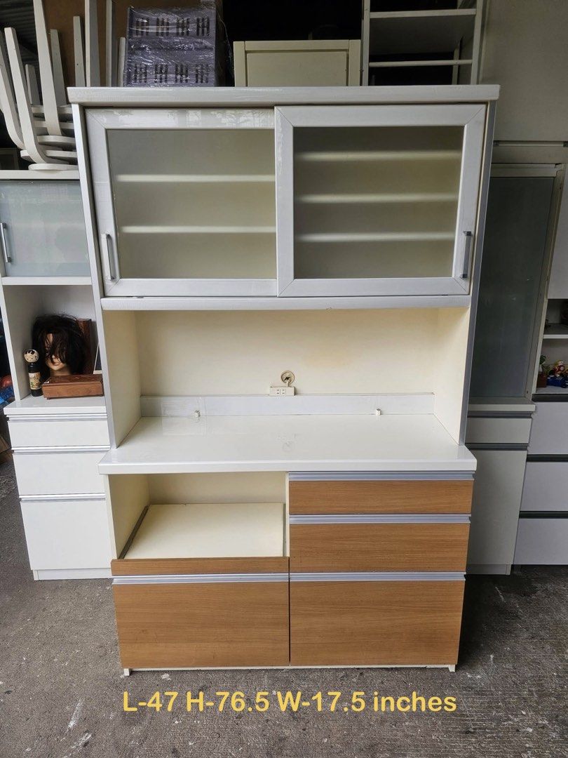 Kitchen Cabinet (Glossy)‼️ (Category: Shelves, Cabinets & Racks) located in Quezon City. Submitted by ledamadel (Listing ID 1469813039, Image 1). Description: Kitchen Cabinet (Glossy)‼️₱9800‼️ ✔L-47 H-76.5 W-17.5 inches 📏 ✔2 Sliding Doors,4 Shelfs & 4 Drawers 🗄 ✔Laminated 🔖 ✔️Socket Ready 🔌 ✔️Compress & Mdf Back! 💢 ✔Scratches As-is! 👌 Location: 40 Aplaya St Napocor Vill. Tandang Sora Quezon City. For inquiry please Pm us or Call. 0906688585