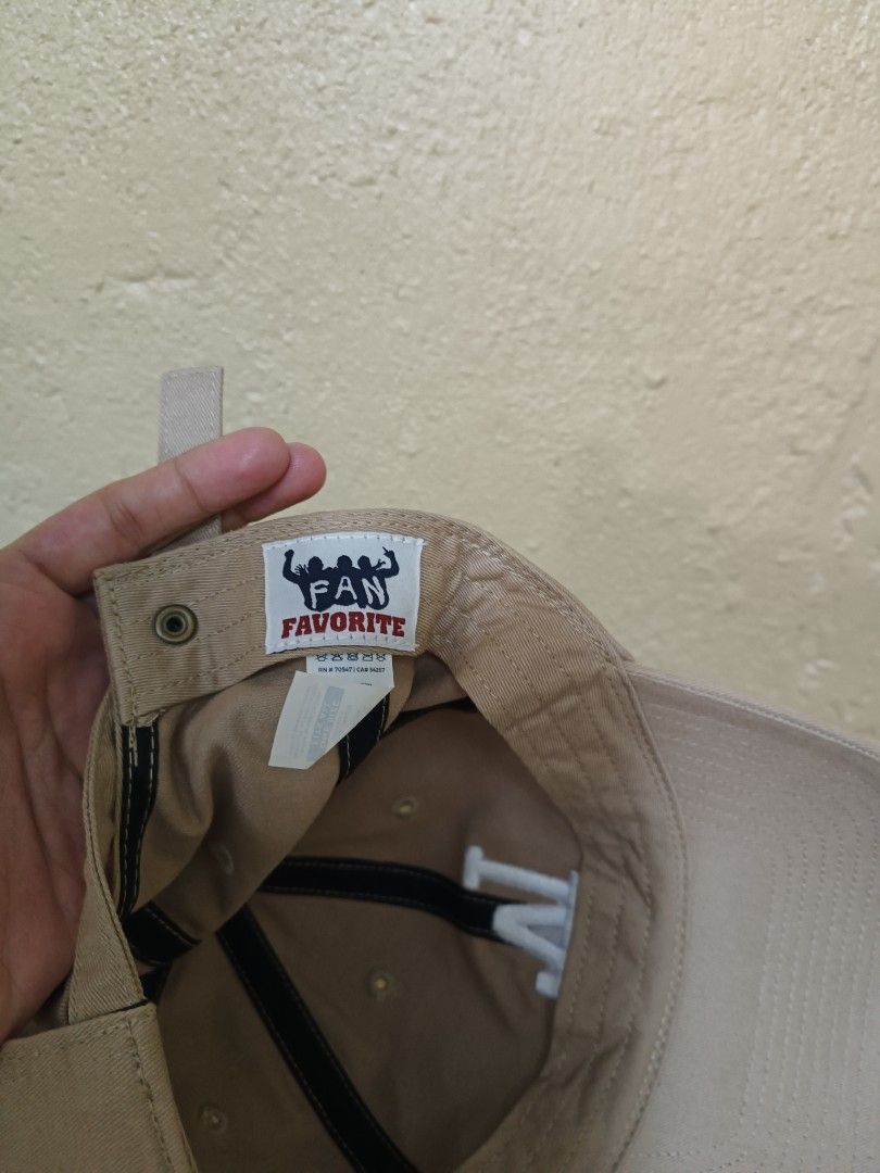 LA Dodgers Cap (Category: Caps & Hats) located in Cavite. Submitted by asfinds (Listing ID 1469828099, Image 2). Description: LA Dodgers dadhat cap Adjustable strapback with a brass metal buckle Khaki Beige colorway As new condition Can ship via j&t or lalamove.