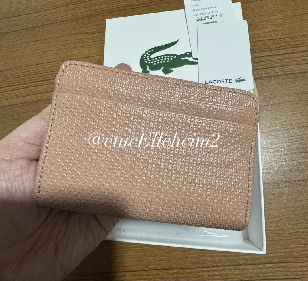 Lacoste Cork XS Zip Coin Wallet (Category: Wallets & Card holders) located in Pasay City. Submitted by michmonteros (Listing ID 1469870680, Image 3). Description: PRELOVED - 100% Brand new with original box and tags attached - Premium split cow leather with a stylish textured finish in cork color - Convenient XS size with multiple card slots inside and outside - Secure zippered main closure to keep your essentials safe - Trusted Carousell seller,