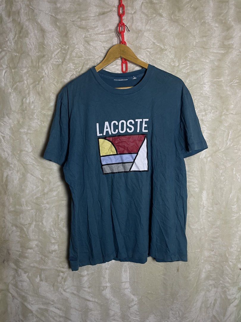 Lacoste graphic tee teal blue medium (Category: Tshirts & Polo Shirts ) located in Molave. Submitted by charlesthrifter (Listing ID 1469863818, Image 1). Description: Issue last pic.