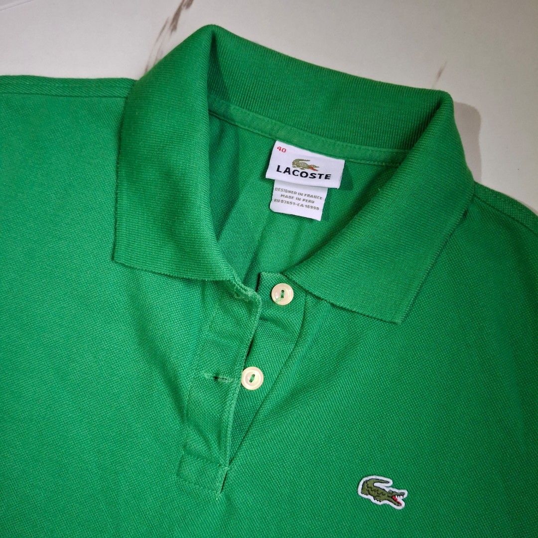 Lacoste Green Polo Shirt (Category: Others Tops) located in Caloocan City. Submitted by mei56313 (Listing ID 1469880296, Image 2). Description: - preloved Lacoste polo shirt - Size: 40/fits M to L loc: Caloocan City MOP: BPI/Gcash MOD: J&T (sf c/o buyer).