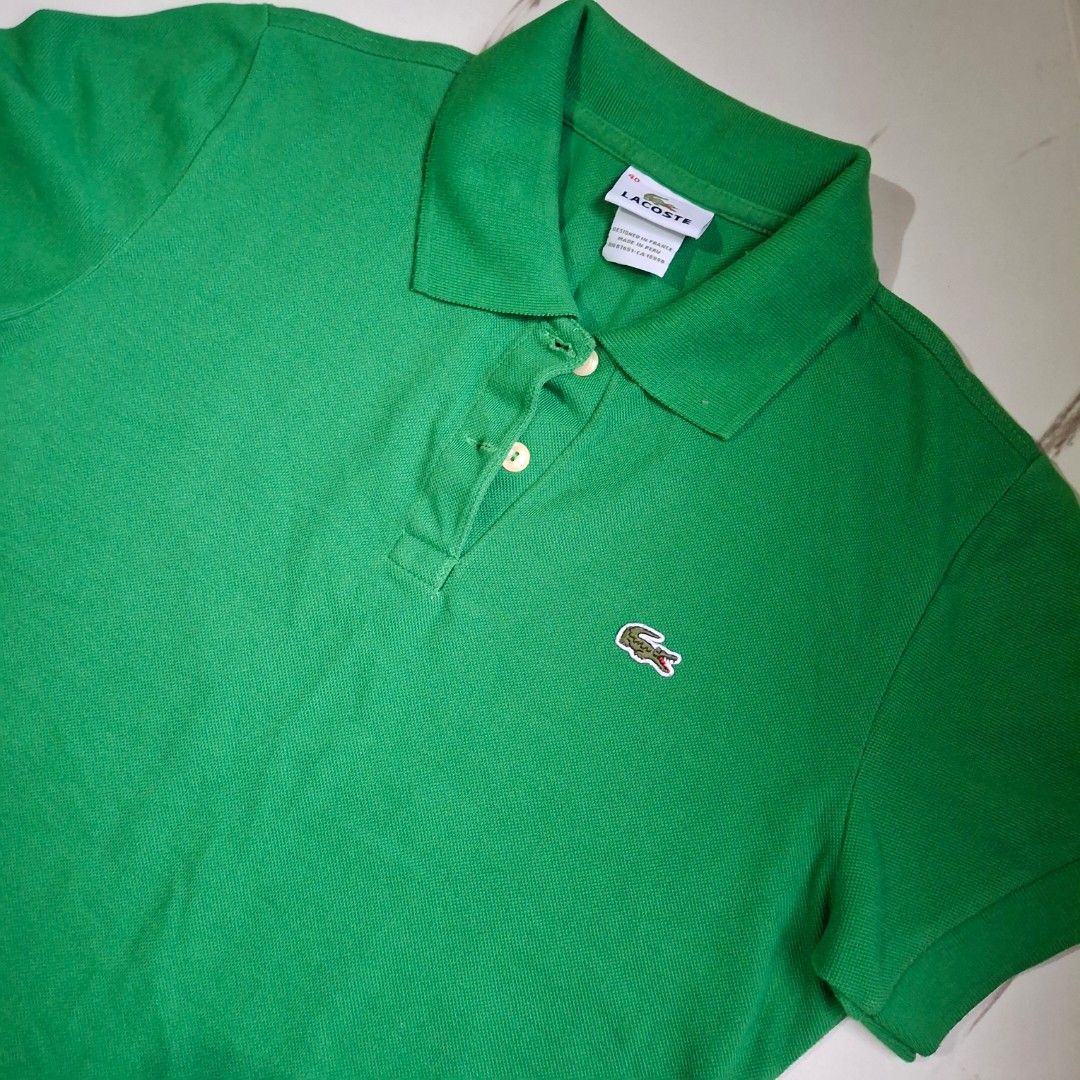 Lacoste Green Polo Shirt (Category: Others Tops) located in Caloocan City. Submitted by mei56313 (Listing ID 1469880296, Image 1). Description: - preloved Lacoste polo shirt - Size: 40/fits M to L loc: Caloocan City MOP: BPI/Gcash MOD: J&T (sf c/o buyer).