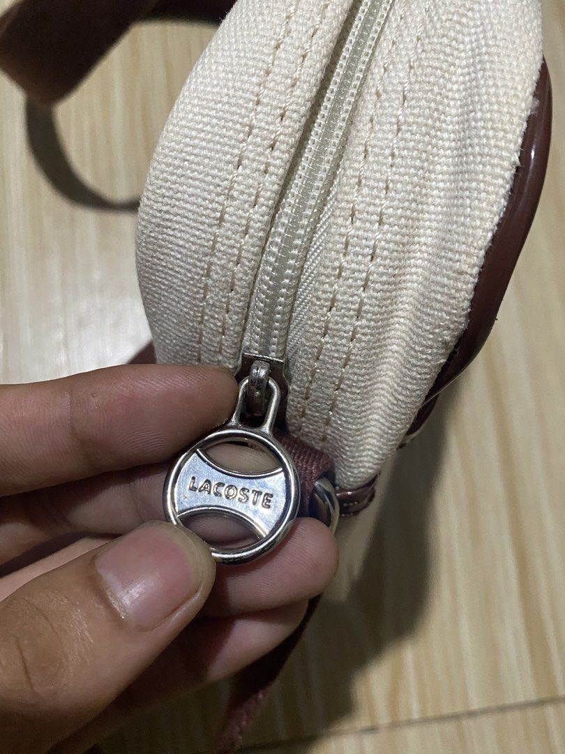 LACOSTE HERITAGE (Category: Luxury Bags & Wallets) located in Davao. Submitted by maikes_finds (Listing ID 1469922736, Image 3). Description: GOOD CONDITION NO SCRATCH ON EDGES HAVE MINOR FLAW SEE LAST PIC COMPLETE TAGS.