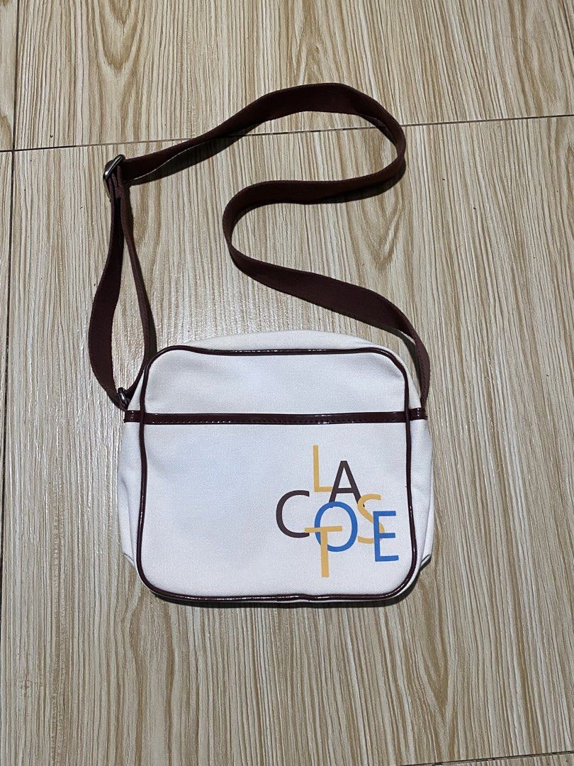 LACOSTE HERITAGE (Category: Luxury Bags & Wallets) located in Davao. Submitted by maikes_finds (Listing ID 1469922736, Image 1). Description: GOOD CONDITION NO SCRATCH ON EDGES HAVE MINOR FLAW SEE LAST PIC COMPLETE TAGS.