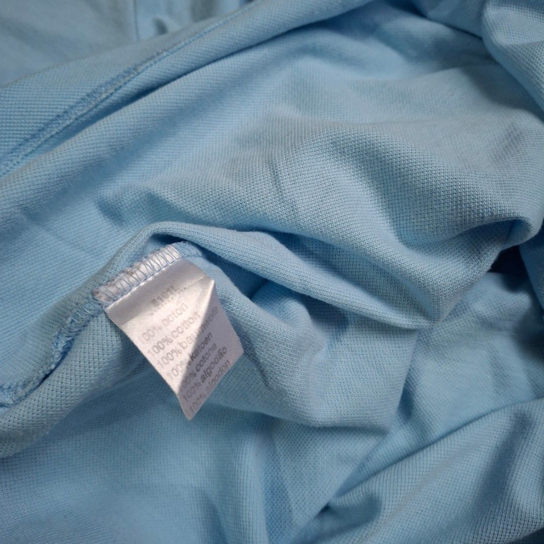 Lacoste Light Blue Polo Shirt (Category: Others Tops) located in Caloocan City. Submitted by mei56313 (Listing ID 1469878595, Image 3). Description: - preloved Lacoste polo shirt (authentic) - size 36/S loc: Caloocan City MOP: BPI/Gcash MOD: J&T (sf c/o buyer).
