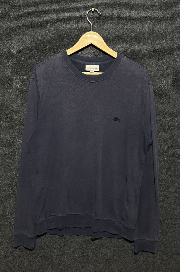 Lacoste long sleeve (Category: Longsleeves) located in M'Lang. Submitted by thriftholic25 (Listing ID 1469923385, Image 1). Description: Lacoste long sleeve the picture may vary due to lightning dark blue is the original color .