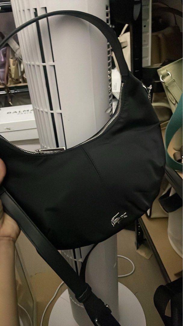 Lacoste Nylon 2 Way Half Moon Bag (Category: Cross-body Bags) located in Manila. Submitted by ig.deiclacio (Listing ID 1469857658, Image 1). Description: On hand in PH Vbr me: 09957850054.