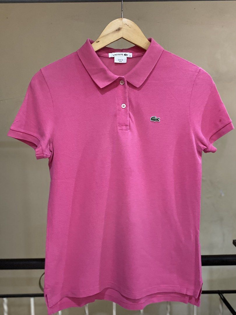 Lacoste Pink Polo Shirt Size 38 (Category: Tshirts & Polo Shirts ) located in Rizal. Submitted by channzy (Listing ID 1469821983, Image 1). Description: - Brand: Lacoste - Style: Classic cotton petit piqué polo shirt - Color: Vibrant pink - Size: 38 (marked on collar tag) - Details: Signature embroidered green crocodile logo, two-button placket, ribbed collar and armbands - Origin: Made in Peru - Condition: Clean inside and out with clear inner c