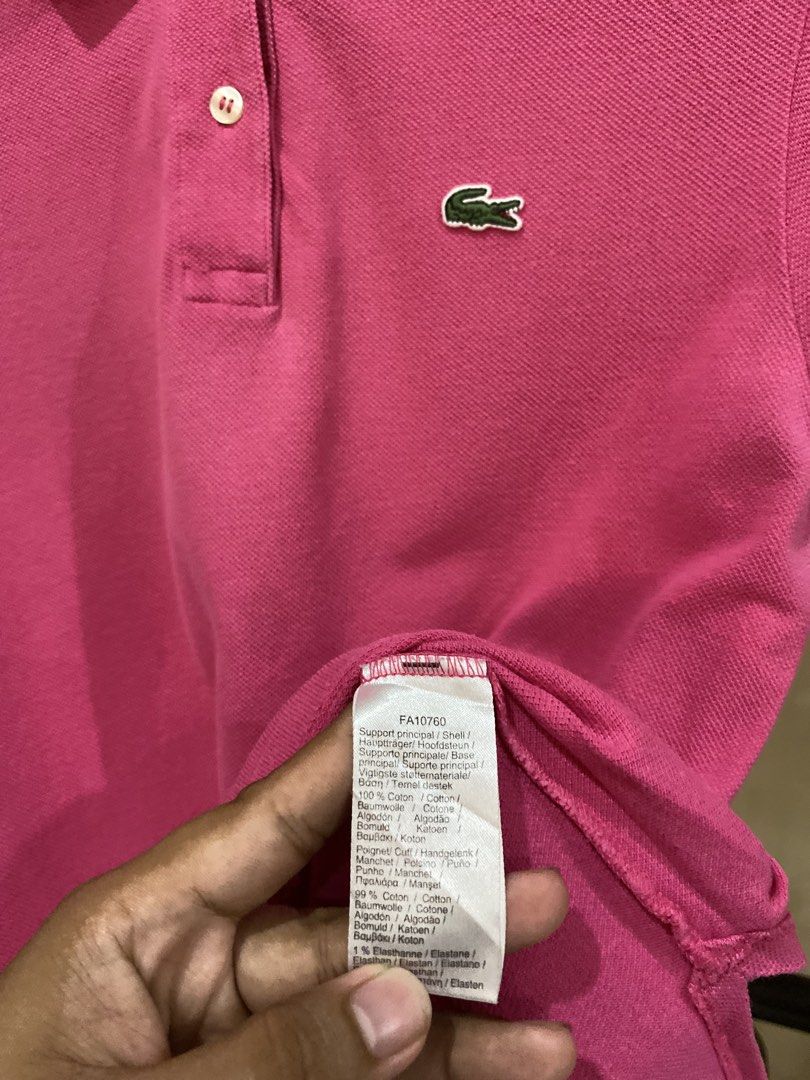 Lacoste Pink Polo Shirt Size 38 (Category: Tshirts & Polo Shirts ) located in Rizal. Submitted by channzy (Listing ID 1469821983, Image 3). Description: - Brand: Lacoste - Style: Classic cotton petit piqué polo shirt - Color: Vibrant pink - Size: 38 (marked on collar tag) - Details: Signature embroidered green crocodile logo, two-button placket, ribbed collar and armbands - Origin: Made in Peru - Condition: Clean inside and out with clear inner c