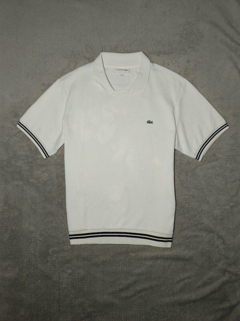 Lacoste Polo Shirt (Category: Tshirts & Polo Shirts ) located in Cebu City. Submitted by authenticgrids (Listing ID 1469855286, Image 1). Description: Lacoste , Polo Shirt Classic Collar Taken Photos may vary due to light 📸 Excellent/Like New Condition ✨ Issue/s:None Needs Re wash only ✨ Size on Tag 🏷️ FR 4 US M Dimensions Width 20 inches Length 26 inches 📥📥📥📥📥 DM us for more details ☺️.