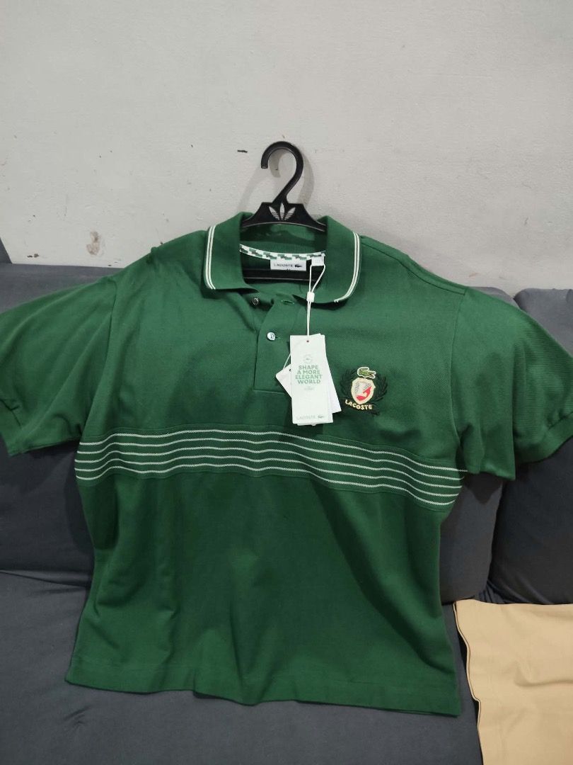 Lacoste Polo Shirt Assorted Colors (Category: Tshirts & Polo Shirts ) located in Manila. Submitted by amberlove020409 (Listing ID 1469904570, Image 2). Description: - Brand: Lacoste - Quantity: Bundle of 3 polo shirts - Colors: Beige, Green (horizontal stripes with crest logo), and Bright Blue - Details: Classic collar with button placket, short sleeves, and iconic crocodile branding - Condition: Great everyday style, excellent addition to your c