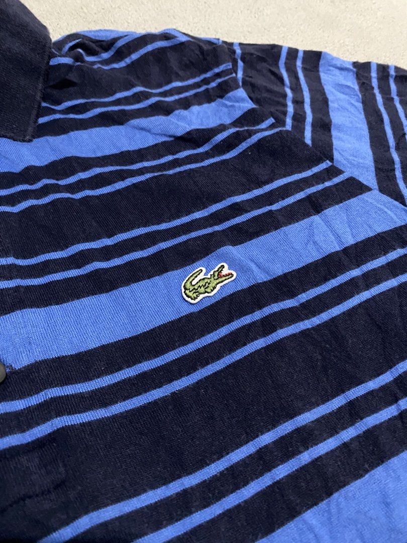 Lacoste polo shirts (Category: Tshirts & Polo Shirts ) located in Tabaco. Submitted by centthrif55361 (Listing ID 1469848397, Image 2). Description: Lactose Size 3 on tag W:18.4 L:27.3 Very good condition Color rate 9.5/10 Issue last photo Need wash .